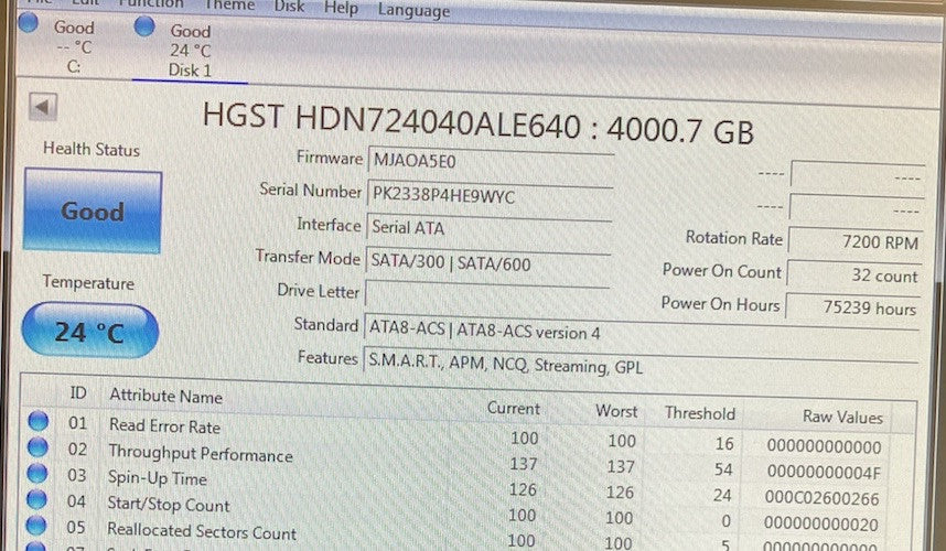 6086854