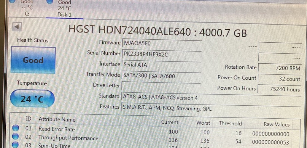 6086854