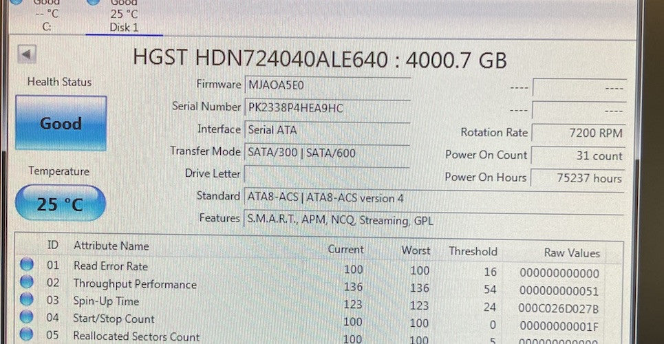 6086854