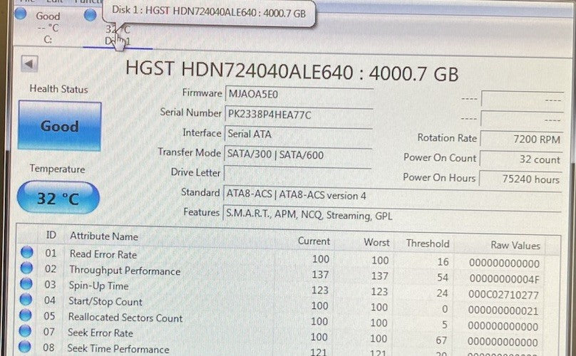 6086854